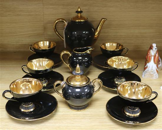 An Italian retro black and gold coffee service, setting for six, with Fiorentine Italy painted mark